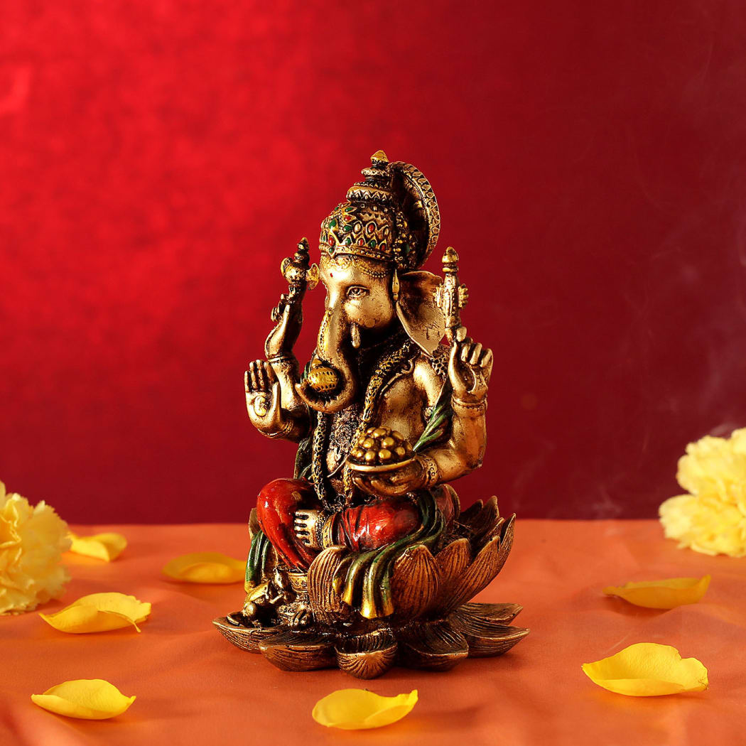 Divine Ganesha: 6.5-Inch Resin Elegance - ShreejaKriti